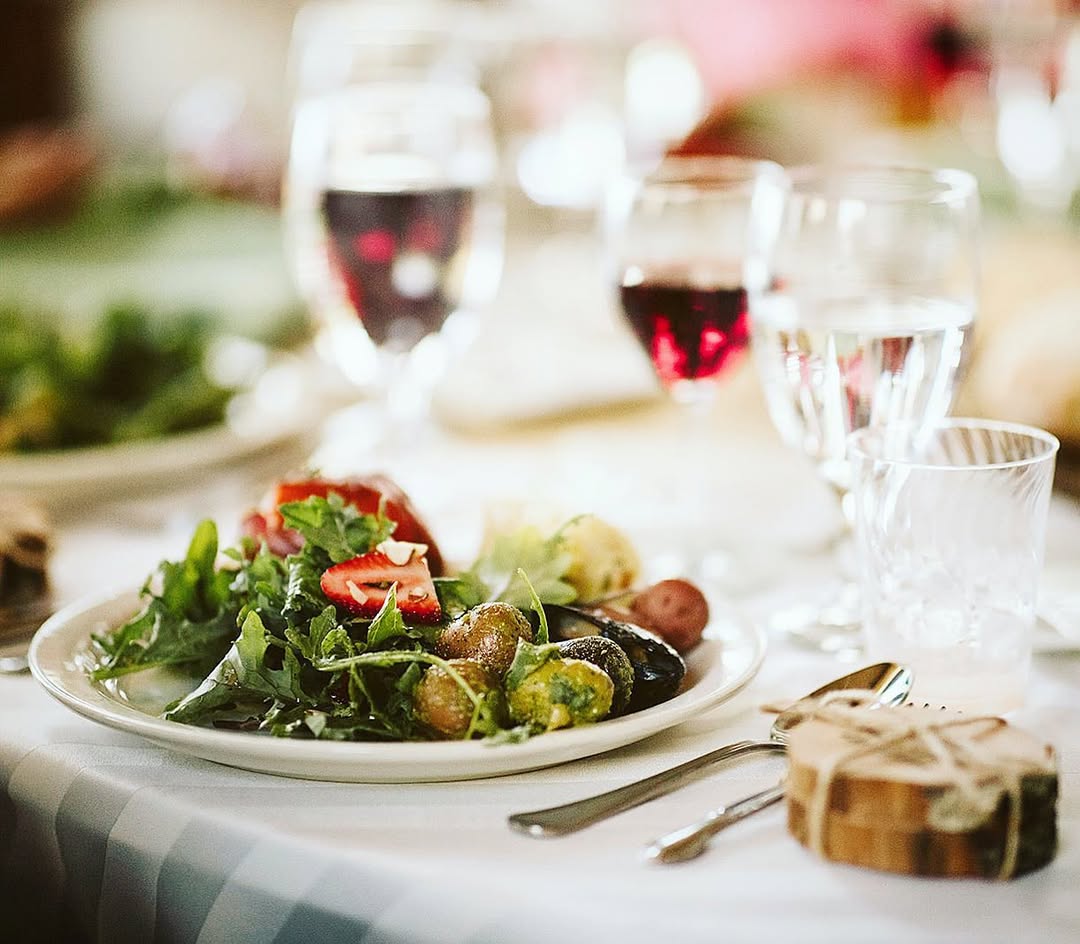 Plated dinner with wine at a private gathering